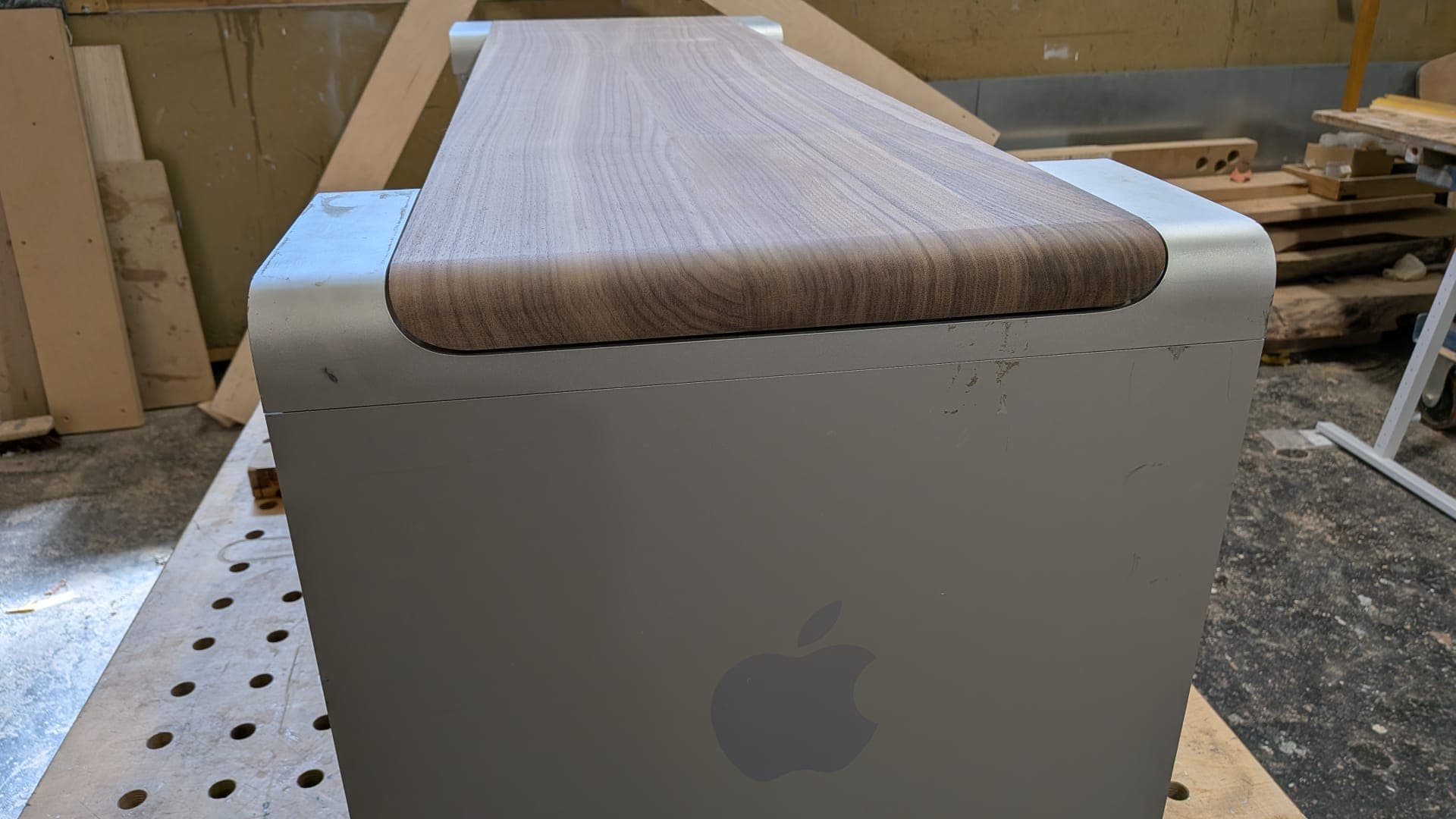 Close-up of American walnut grain flowing over a rounded edge.